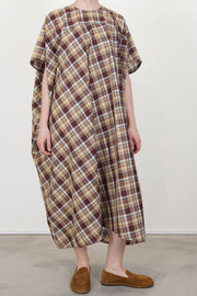model wearing sofie d'hoore dress daiki check toffee