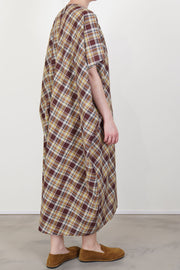 profile view of sofie d'hoore dress daiki check toffee short sleeves and flowy cut