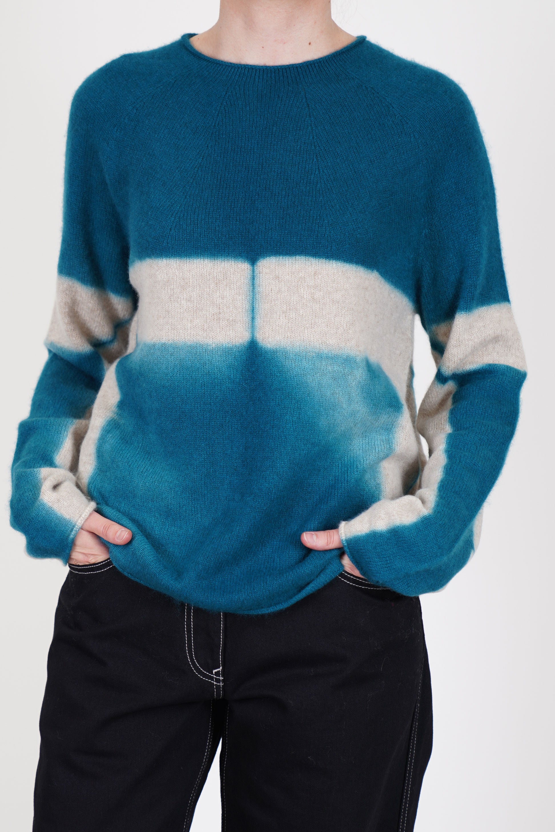 suzusan cashmere seamless pullover long dark teal sand crafted in ultra soft cashmere material and hand dyed using the itajime shibori books technique. 
