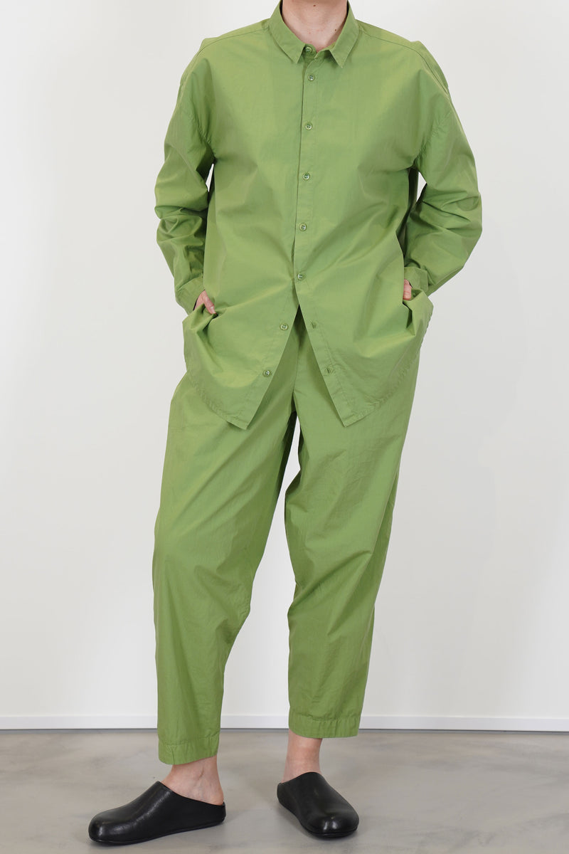 model wearing toogood acrobat trousers poplin grass with matching blouse for an everyday minimalist and comfortable fit