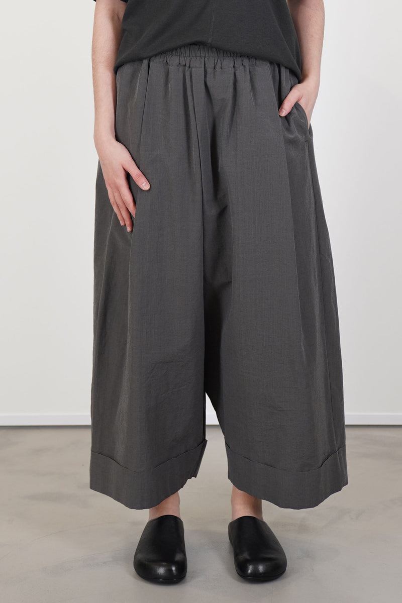model wearing toogood baker trousers cotton silk pencil
