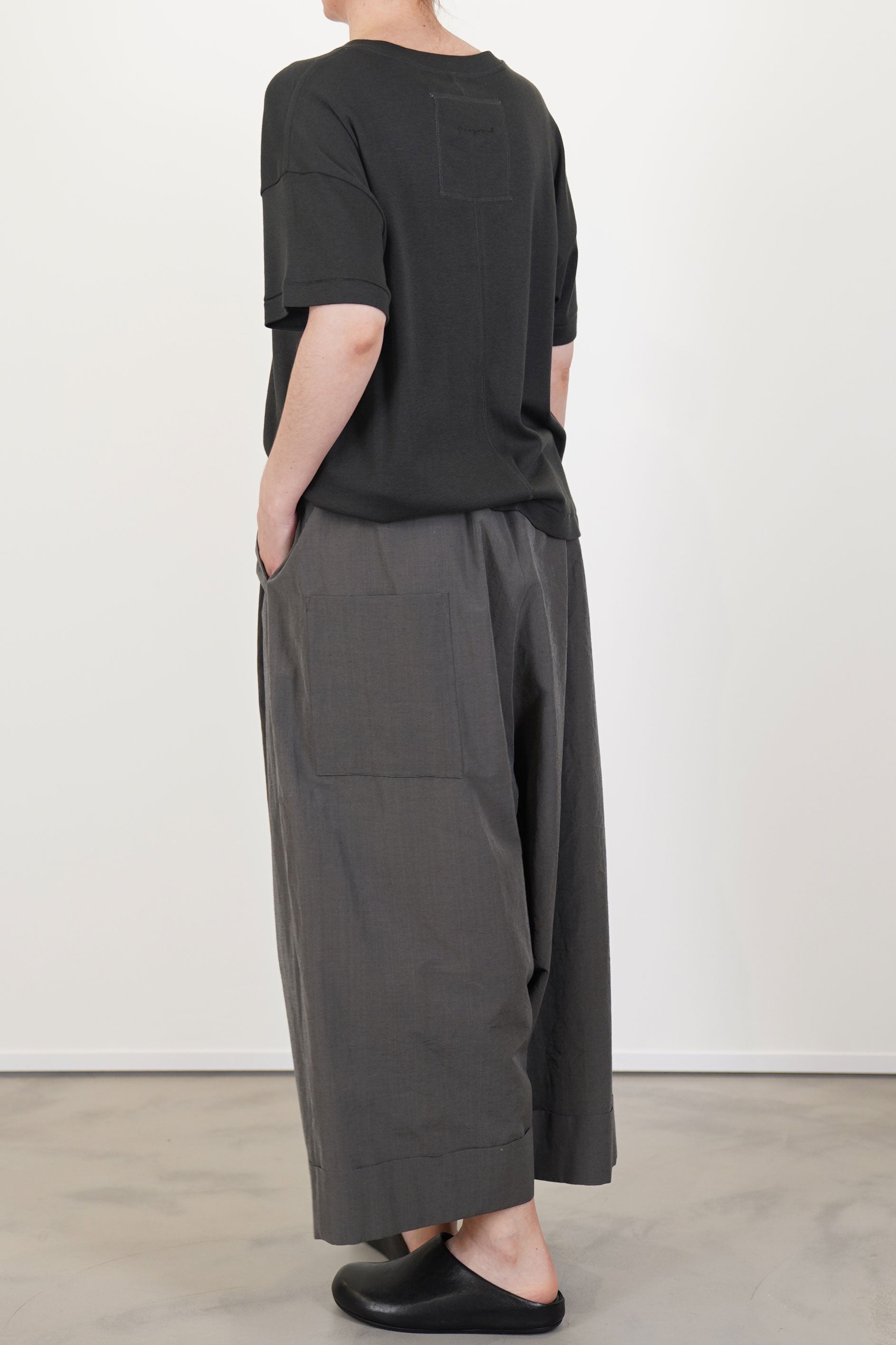 back view of toogood baker trousers cotton silk pencil structural back pocket detail