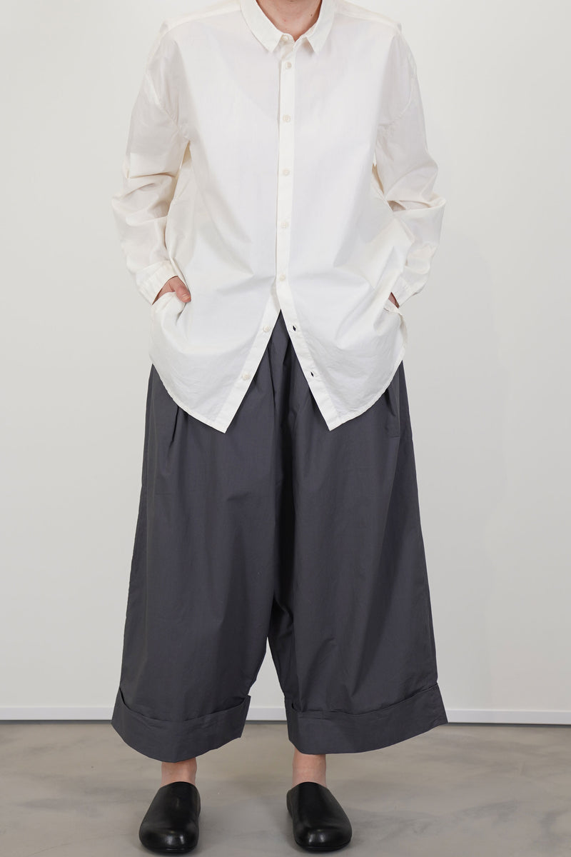 model wearing toogood baker trousers polin cotton pencil 