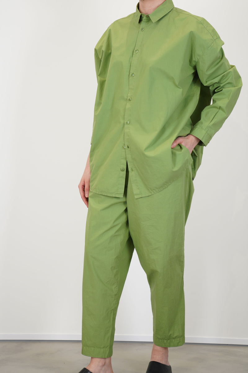 model wearing toogood draughtsman shirt poplin grass with matching trousers for a structural and minimalist look