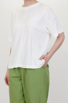 profile view of toogood fencer t-shirt chalk soft drape and soft material