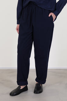 toogood gymast trousers ink feature an elasticated waistband and a tapered leg 