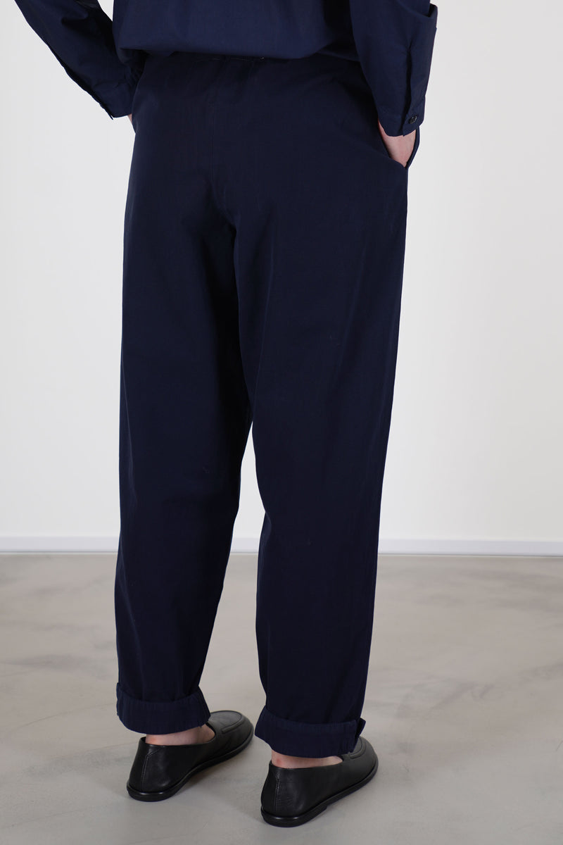 back view of toogood gymast trousers ink tapered leg, side pockets and relaxed cut.