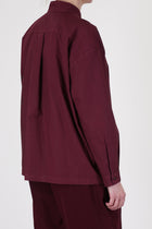 Back view of Toogood Physician Shirt in Port – features yoke detail and relaxed, boxy silhouette