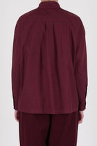 Rear view of Toogood’s poplin shirt in Port – showcasing lightweight fabric and tailored yoke design